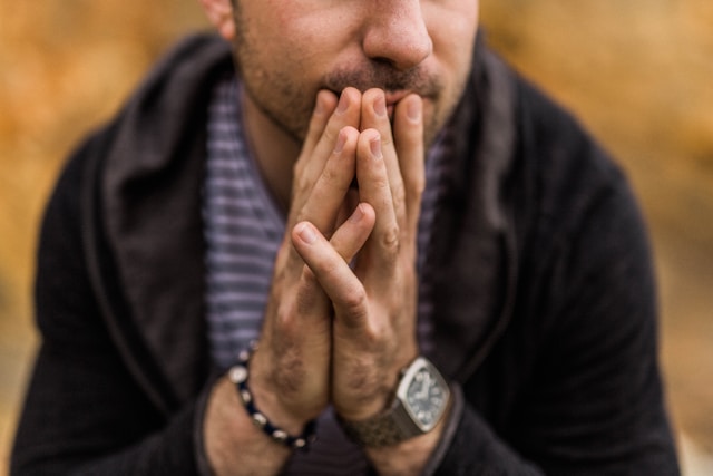 A man sitting and contemplating