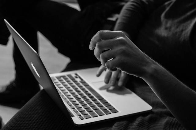 Person sitting at a laptop