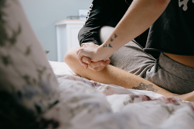 Couple sitting cross legged in intimacy