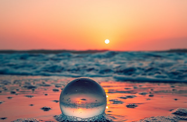 Ocean bubble against the sunset