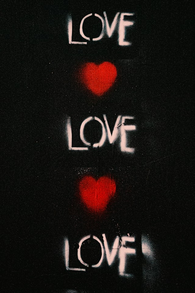 The word love with hearts